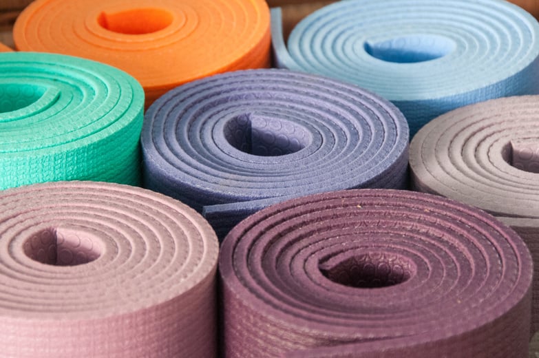 Rolled colorful yoga mats